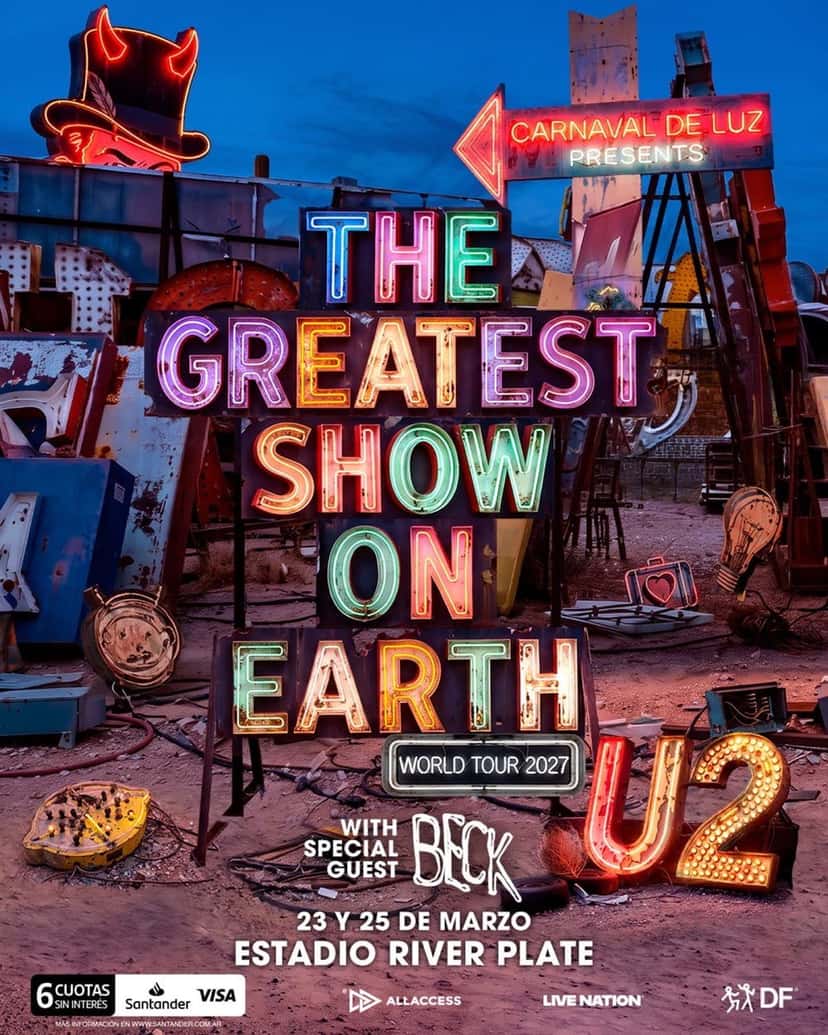 Afiche oficial de los shows de U2 en River: la frase THE GREATEST SHOW ON EARTH en letras de neón de colores sobre un cementerio de carteles viejos en el desierto al atardecer, con una flecha roja que dice CARNAVAL DE LUZ PRESENTS, un sombrero de copa de neón con cuernos, el logo de U2 hecho con lamparitas, la leyenda WITH SPECIAL GUEST BECK, las fechas 23 y 25 de marzo en el Estadio River Plate y, abajo, los logos de Santander Visa con 6 cuotas sin interés, All Access, Live Nation y DF